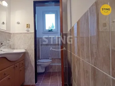 Toilet; tile floor, tile floor