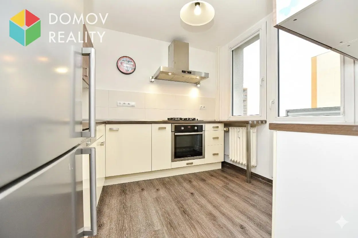 Kitchen; kitchen appliances, wood floor, natural light, modern style