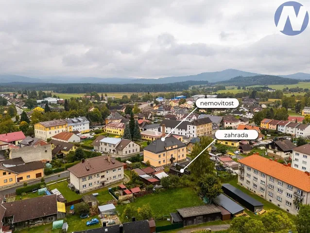 House and surroundings; view