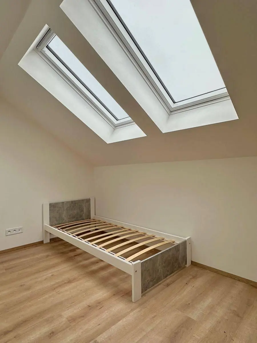 Bedroom; natural light, wood floor