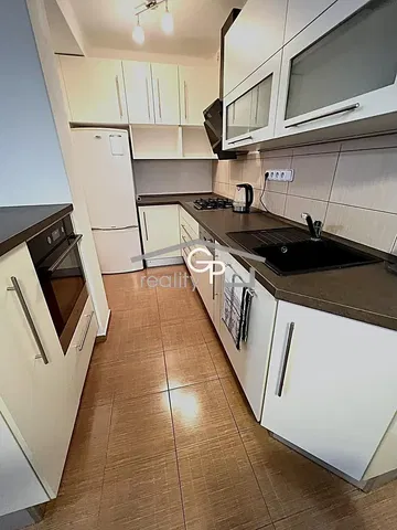 Kitchen; kitchen appliances, tile floor, renovated, natural light, modern style