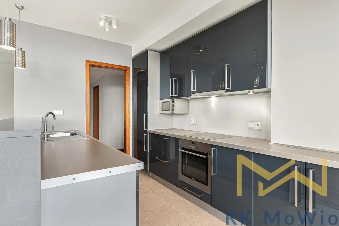 Kitchen; kitchen appliances, tile floor, renovated, natural light, modern style