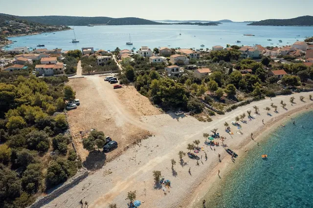 House and surroundings; view