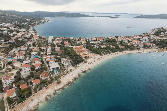 House and surroundings; view