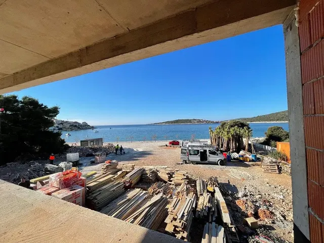 House and surroundings; view, needs renovation