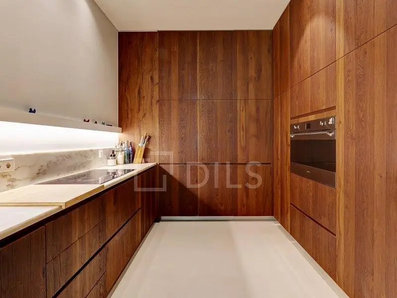 Kitchen; kitchen appliances, wood floor, renovated, natural light