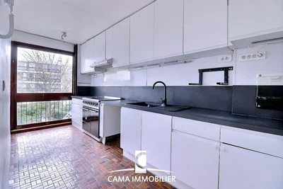 Kitchen; kitchen appliances, view, tile floor, renovated, natural light