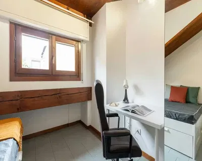 Slaapkamer; natuurlijk licht, houten balken