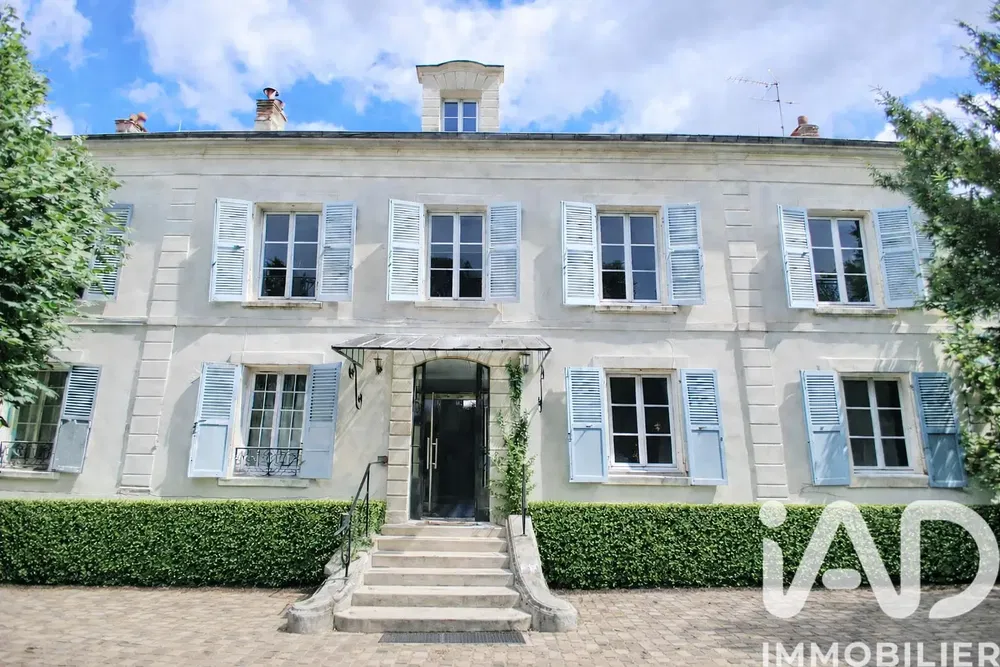 House and surroundings; view