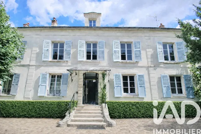 House and surroundings; view