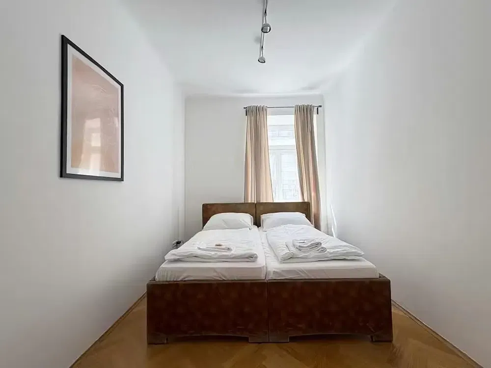 Bedroom; natural light, wood floor