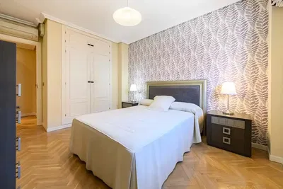 Bedroom; wood floor, natural light