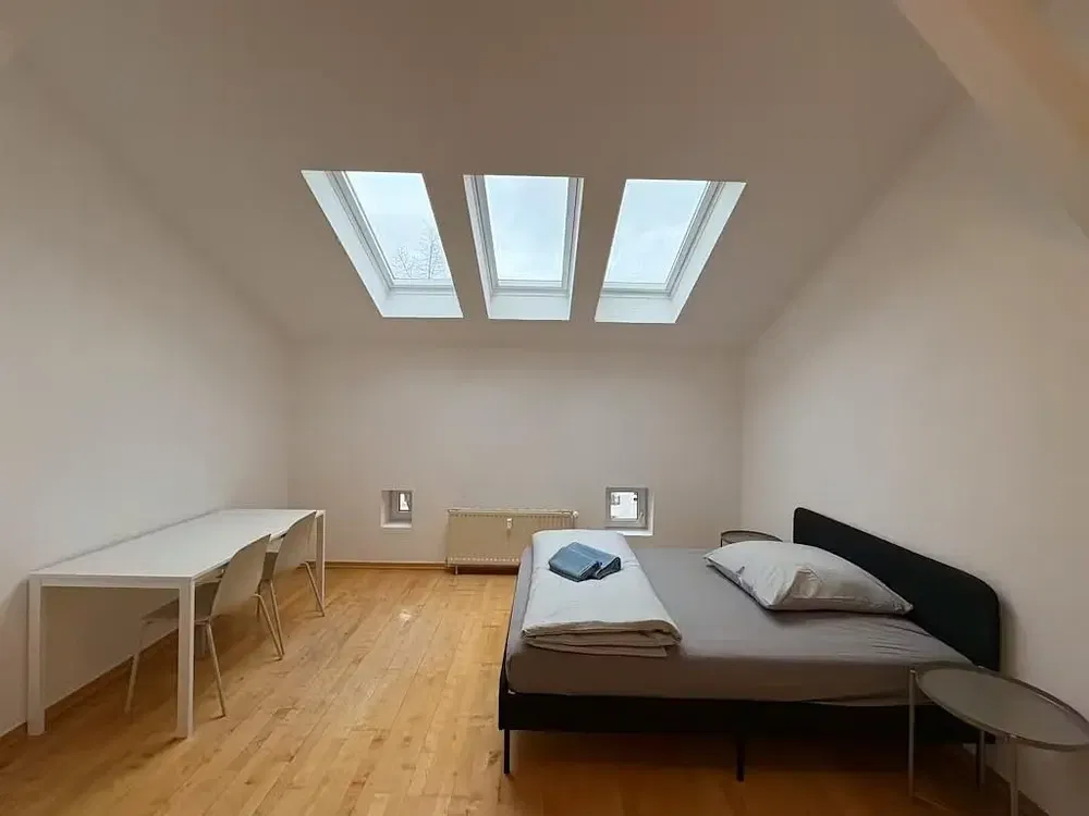 Bedroom; wood floor, natural light
