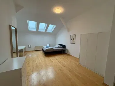 Bedroom; wood floor, natural light