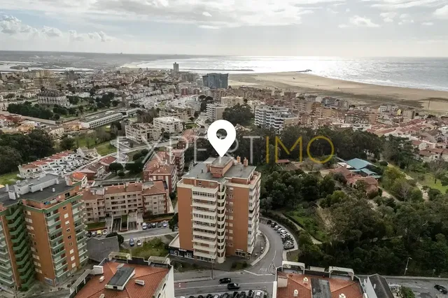 House and surroundings; view