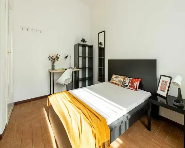 Bedroom; natural light, wood floor