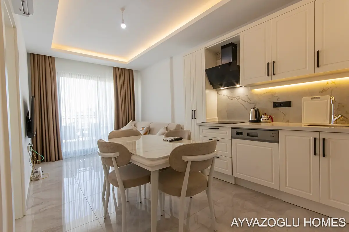 Kuchyně; dlažba, přirozené světlo, moderní styl, kuchyňské spotřebiče