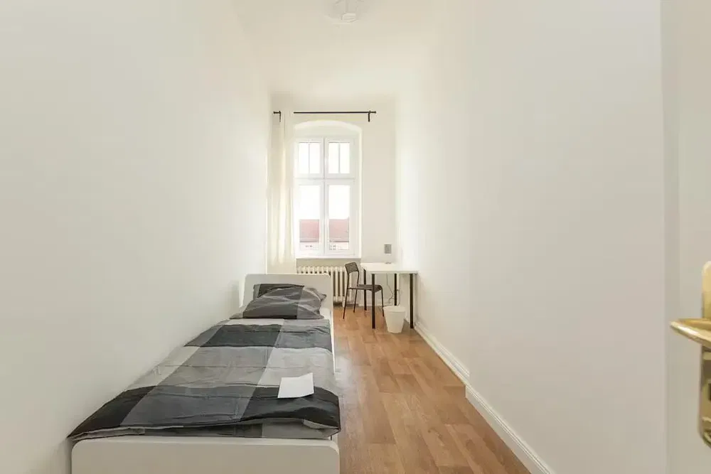 Bedroom; wood floor, natural light