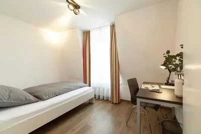 Bedroom; natural light, wood floor