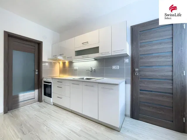 Kitchen; kitchen appliances, tile floor, renovated, natural light