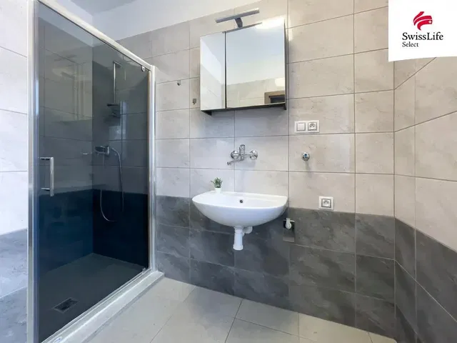 Bathroom; tile floor, renovated, natural light, modern style