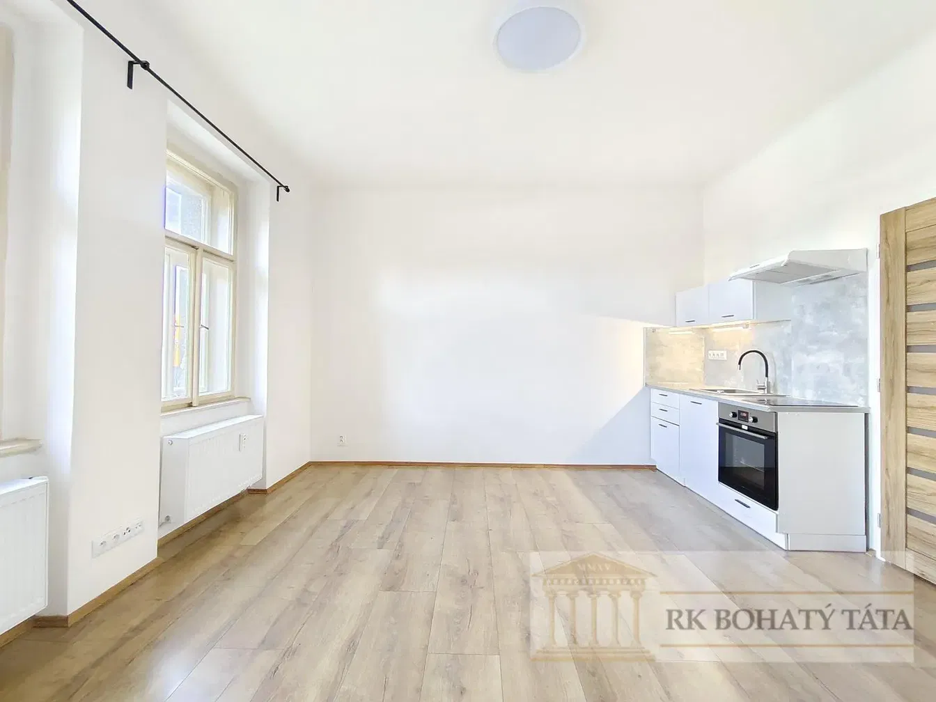 Kitchen; wood floor, natural light, renovated
