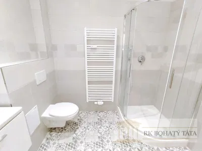 Bathroom; tile floor, renovated, natural light, modern style