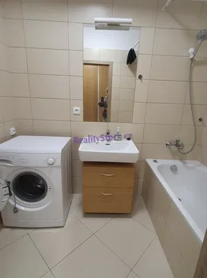 Bathroom; tile floor, renovated, natural light, modern style