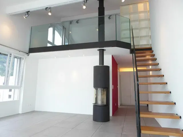 Living room; fireplace, tile floor, view, natural light
