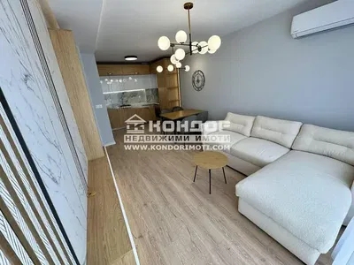 Dnevni boravak; moderan stil, drveni pod, prirodna svjetlost