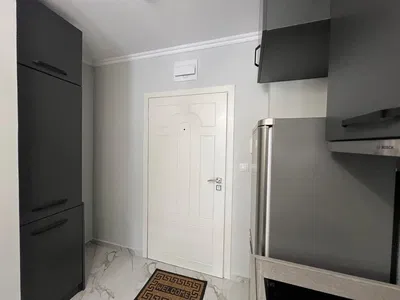 Kuchyně; kuchyňské spotřebiče, dlažba, po rekonstrukci