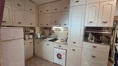 Kuchyně; kuchyňské spotřebiče, dlažba, po rekonstrukci