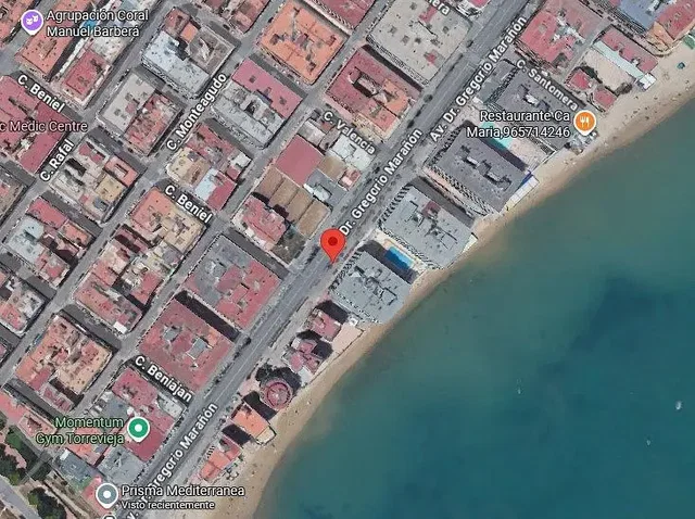 House and surroundings; view
