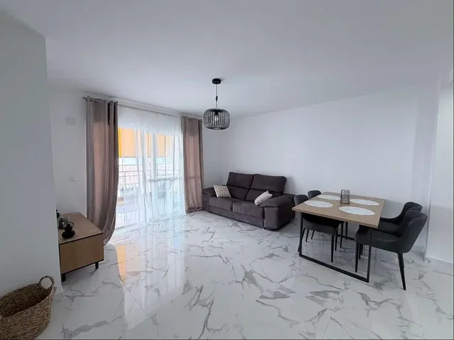 Living room; tile floor, natural light, modern style