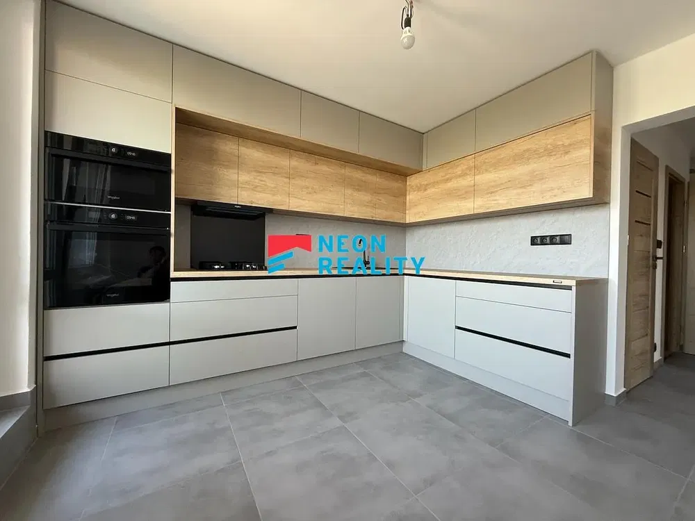 Kitchen; kitchen appliances, renovated, tile floor, natural light, modern style