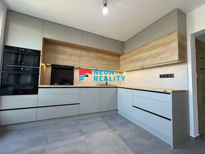 Kitchen; kitchen appliances, renovated, tile floor, natural light, modern style