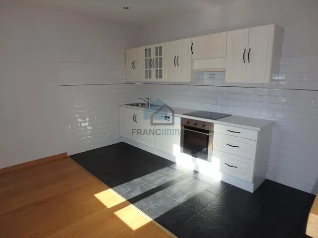 Kitchen; kitchen appliances, tile floor, renovated, natural light