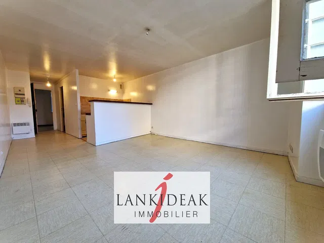 Living room; tile floor, needs renovation