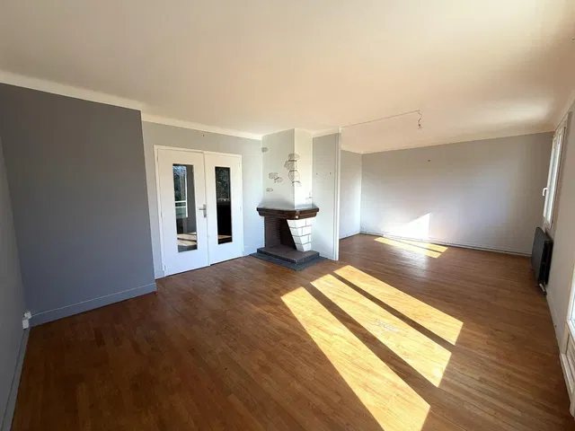 Living room; fireplace, wood floor, natural light