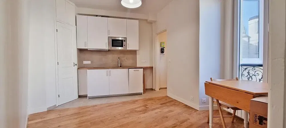 Kitchen; kitchen appliances, wood floor, natural light, modern style