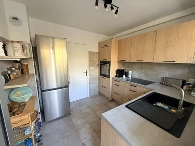 Kitchen; kitchen appliances, tile floor, renovated, natural light