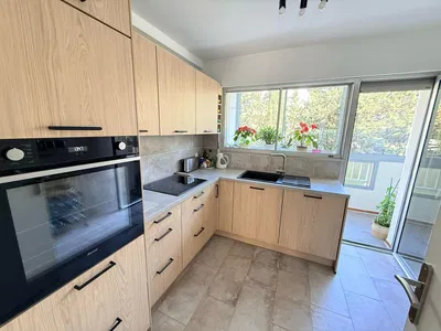 Kitchen; kitchen appliances, natural light, modern style, tile floor
