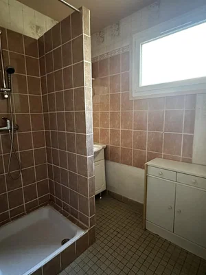 Bathroom; tile floor, needs renovation, natural light