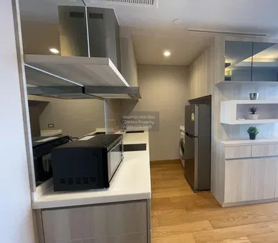 Kitchen; kitchen appliances, wood floor, renovated, natural light