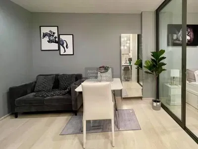 Living room; modern style, natural light, wood floor