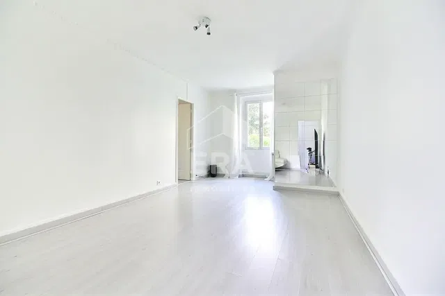 Living room; natural light, wood floor, renovated