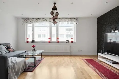 Soggiorno; luce naturale, pavimento in legno, stile moderno