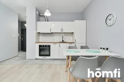 Kitchen; kitchen appliances, natural light, modern style, wood floor