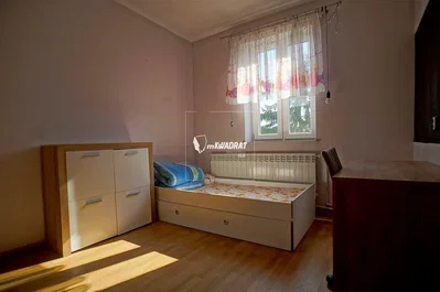 Bedroom; wood floor, natural light