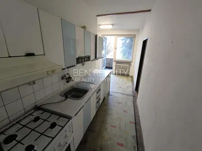 Kitchen; needs renovation, natural light